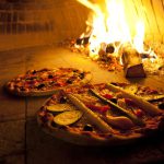 Cottura al forno a legna: scopri i benefici del metodo a cottura indiretta per una cucina sana e gustosa